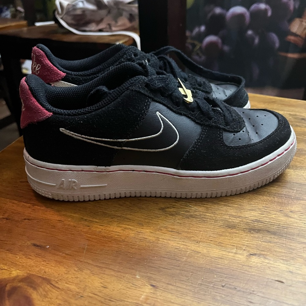 Youth Nike sneakers.